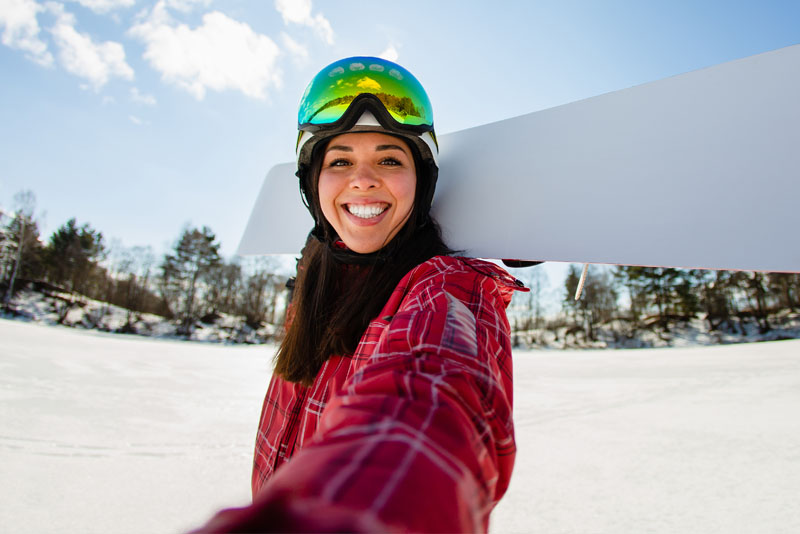 Image of a group of friends posing for a selfie.